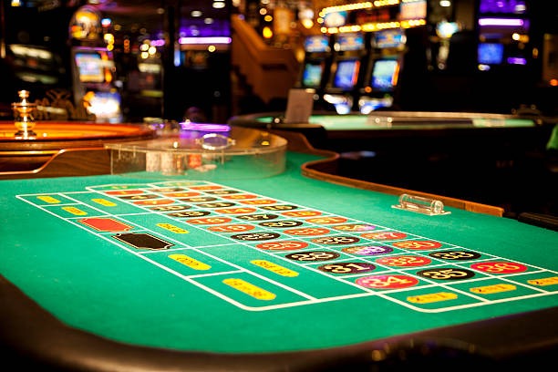 Live blackjack studio with multi-camera angles Live blackjack table with dealer and multi-camera view